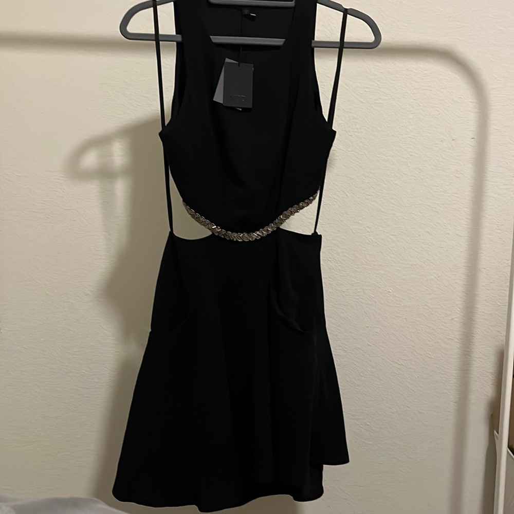 Cut out black dress with silver detailing